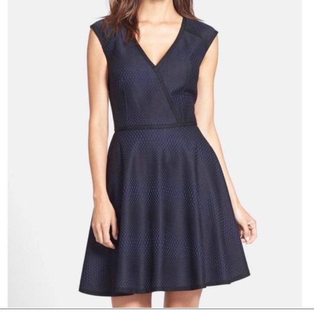Trina Turk navy and black back cut out dress fit to flare 4